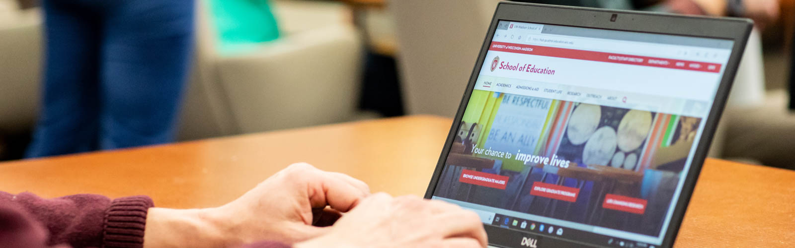 Image of person at laptop
